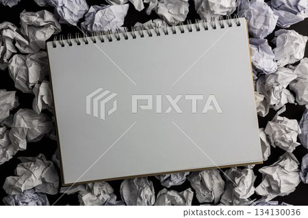 Paper notebook on crumpled paper Paper notebook on crumpled paper 134130036