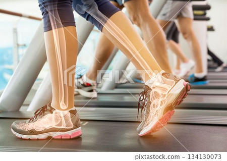 Jogger experiencing ankle pain Jogger experiencing ankle pain 134130073