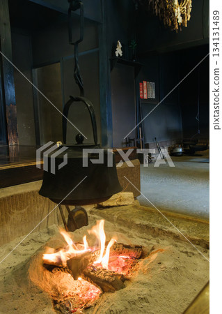 Iron bottle in the hearth 134131489