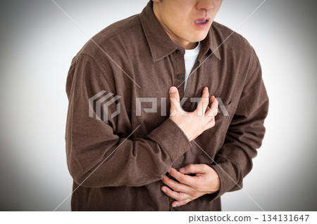 Middle-aged man suffering from chest pain 134131647