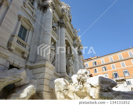 A palace shining against a refreshing blue sky. Stone sculptures of mythical sea gods. Design, decoration, advertising, poster material. A palace shining against a refreshing blue sky. Stone sculptures of mythical sea gods. Design, decoration, advertising, poster material. 134131852