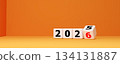 2026 New Year and Business Transition Concept with White Rolling Dice on Orange Background 134131887