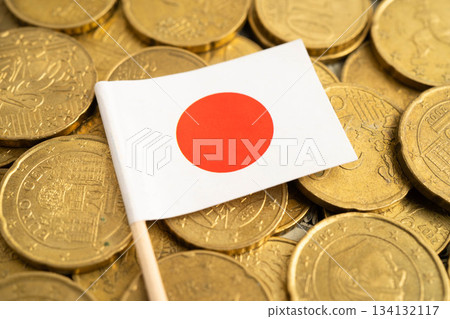 Japan flag on coins background for finance banking business. 134132117