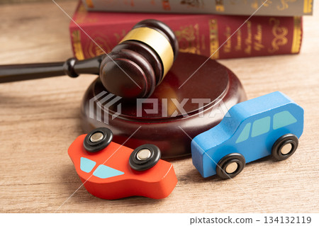 Car accident lawsuit and insurance, Judge hammer with car model. 134132119