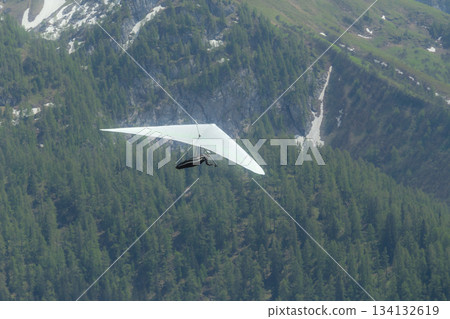 Hang gliding above mountain valley near Jenner mount Berchtesgaden National Park Hang gliding above mountain valley near Jenner mount Berchtesgaden National Park 134132619
