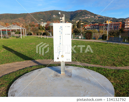 Sundial in park early in morning. Educational and models for astronomy.  134132792