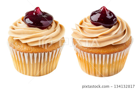 Vanilla cupcake topped with creamy swirl frosting and berry jam, isolated on white transparent background 134132817
