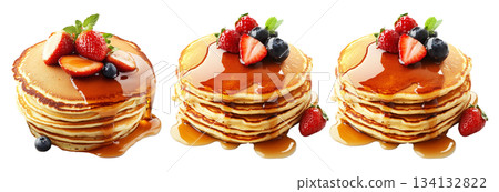 Stack of pancakes topped with syrup, raspberries, blueberries, and mint isolated on white transparent background 134132822