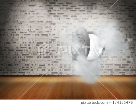 Open safe in dust cloud on brick lined wall 134135476