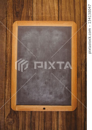 Flat design vector illustration is showing wood-framed chalkboard on rustic wooden plank background Flat design vector illustration is showing wood-framed chalkboard on rustic wooden plank background 134138047