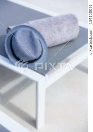 High angle view of hat and towel on table High angle view of hat and towel on table 134138051