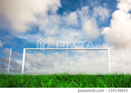 Football goal under blue cloudy sky Football goal under blue cloudy sky 134138055