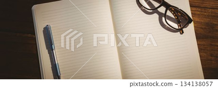 Open book on wooden table Open book on wooden table 134138057