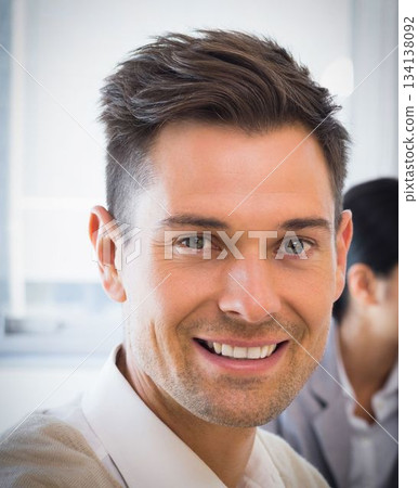 Casual businessman smiling Casual businessman smiling 134138092