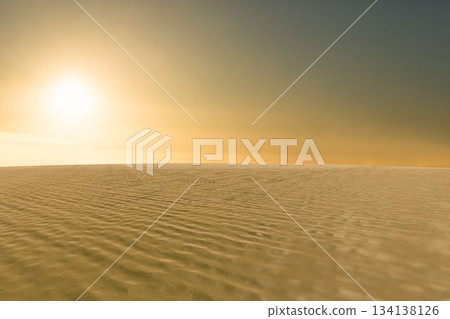 Flat design desert landscape is showing rippled dunes casting shadows under warm glowing sun 134138126