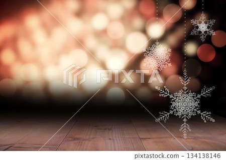 Snowflakes over table against Christmas lights Snowflakes over table against Christmas lights 134138146