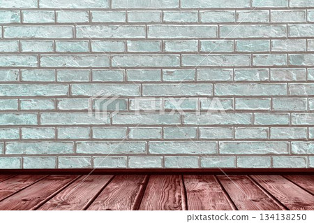 Close-up of white brick wall by hardwood floor 134138250