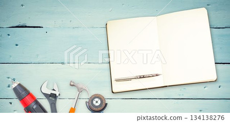 Tools and notepad on wooden background Tools and notepad on wooden background 134138276