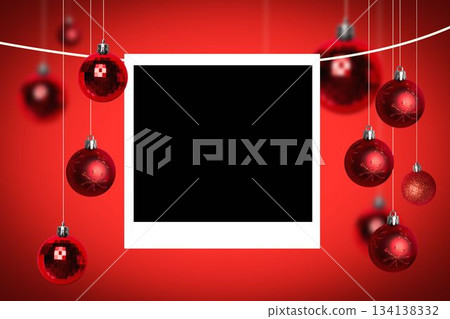 Festive flat design is showing white instant-film frame with hanging red baubles Festive flat design is showing white instant-film frame with hanging red baubles 134138332