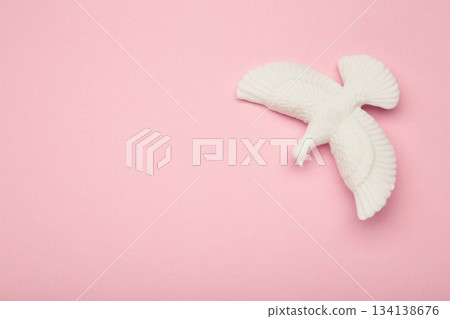 International day of peace or world peace day, symbol of peace - pigeon on pink background International day of peace or world peace day, symbol of peace - pigeon on pink background 134138676