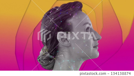 Gazing mid adult woman showing side profile in studio, with network overlay and gradient backdrop 134138874