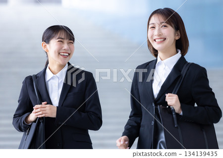 Job hunting: Job seekers having a conversation 134139435