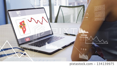 Analyzing woman tracking NFT stats on laptop at office desk with pen, cables, chair, copy space Analyzing woman tracking NFT stats on laptop at office desk with pen, cables, chair, copy space 134139975