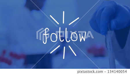 Showing gloved hand holding clear test tube at lab, with red-capped vials, follow text, copy space 134140054