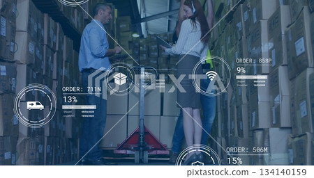 Analyzing digital order overlays warehouse staff using tablet near red pallet jack inside aisle Analyzing digital order overlays warehouse staff using tablet near red pallet jack inside aisle 134140159