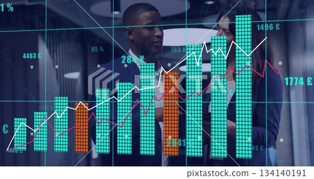 Analysts wearing suits discussing data in office with digital bar and line charts, currency symbols 134140191