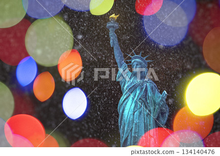 The Statue of Liberty with snow falling in the background at Christmas 134140476
