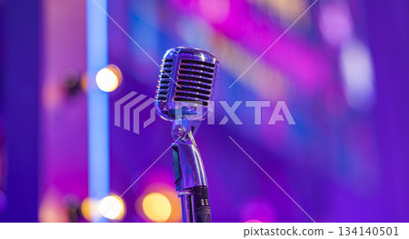 Retro microphone in a karaoke club Retro microphone in a karaoke club 134140501
