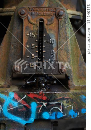 Paint on rusty metal. Rough style, background image. Railway, graffiti. Paint on rusty metal. Rough style, background image. Railway, graffiti. 134140578
