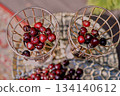 Cherries in large golden dishes Chic serving of dishes. Fruit 134140612