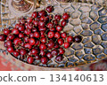 Cherries in large golden dishes Chic serving of dishes. Fruit 134140613