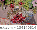 Cherries in large golden dishes Chic serving of dishes. Fruit 134140614
