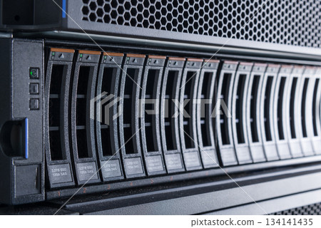 Array of data storage hard drives in internet data center 134141435