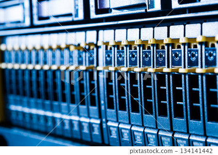 Array of data storage hard drives in internet data center 134141442
