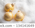 Christmas balls in snow 134141649