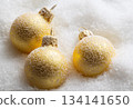 Christmas balls in snow 134141650