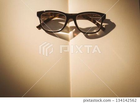 Directly above shot of eyeglasses on book Directly above shot of eyeglasses on book 134142562