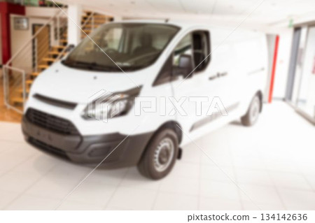 Flat design art is showing white cargo van in showroom with staircase, red beam, glass entrance 134142636