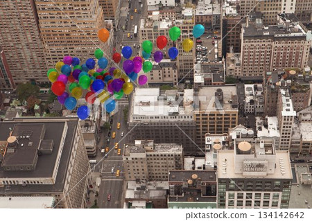 Many colourful balloons above city Many colourful balloons above city 134142642