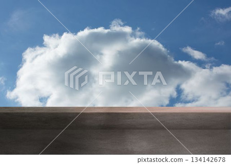 Single white cumulus cloud is floating above concrete ledge under clear blue sky in flat design Single white cumulus cloud is floating above concrete ledge under clear blue sky in flat design 134142678