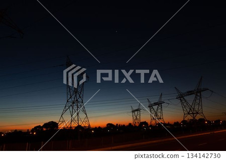 The evening electricity pylon silhouette The evening electricity pylon silhouette 134142730