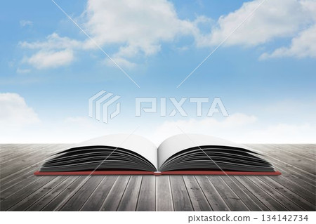 flat design open book with blank pages is lying on wooden deck under sky with clouds flat design open book with blank pages is lying on wooden deck under sky with clouds 134142734
