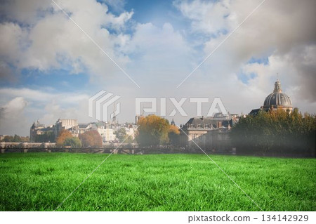 Flat design is showing green grass field with river bridge and domed buildings with autumn trees Flat design is showing green grass field with river bridge and domed buildings with autumn trees 134142929