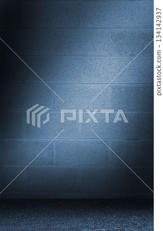 cinder block wall is standing under cool blue spotlight in flat design, with rough concrete floor cinder block wall is standing under cool blue spotlight in flat design, with rough concrete floor 134142937