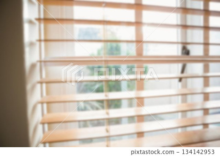 Wooden shutter on window at home 134142953