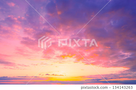 Colorful cloudy sky at sunset. Gradient color. Sky texture. Abstract nature background Colorful cloudy sky at sunset. Gradient color. Sky texture. Abstract nature background 134143263